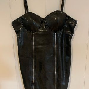 Turn heads in this sexy faux leather mini by Say What?